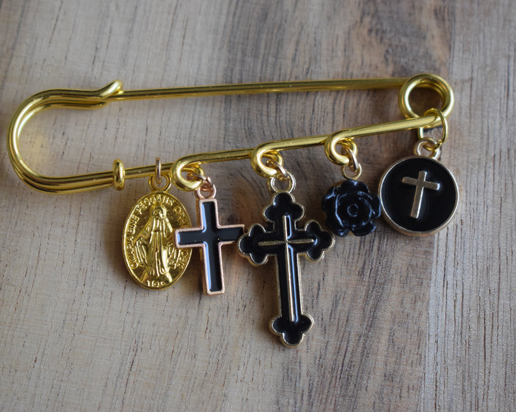 Broche religieuse doré